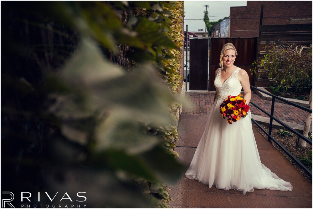 Rustic Outdoor Fall Wedding | An image of a bride in her wedding gown holding her rustic bouquet.  