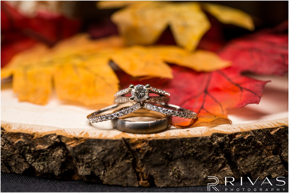 Rustic Outdoor Fall Wedding | A close-up picture of a bride and groom's engagement ring and wedding bands. 