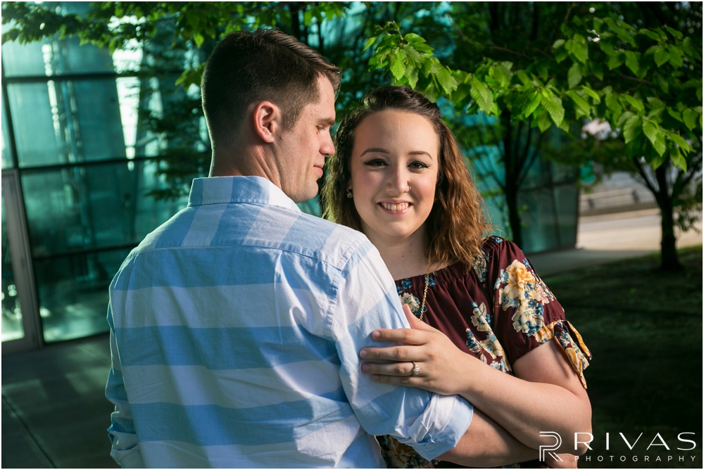 Summertime Crossroads Engagement Session | Picture of an engaged couple on the eastern side of the Kansas City Star Building. 