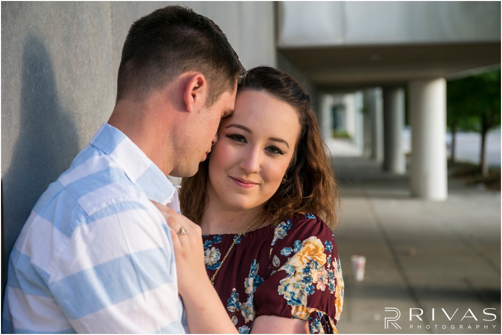 Summertime Crossroads Engagement Session | Picture of an engaged couple on the west side of the Kansas City Star Building. 