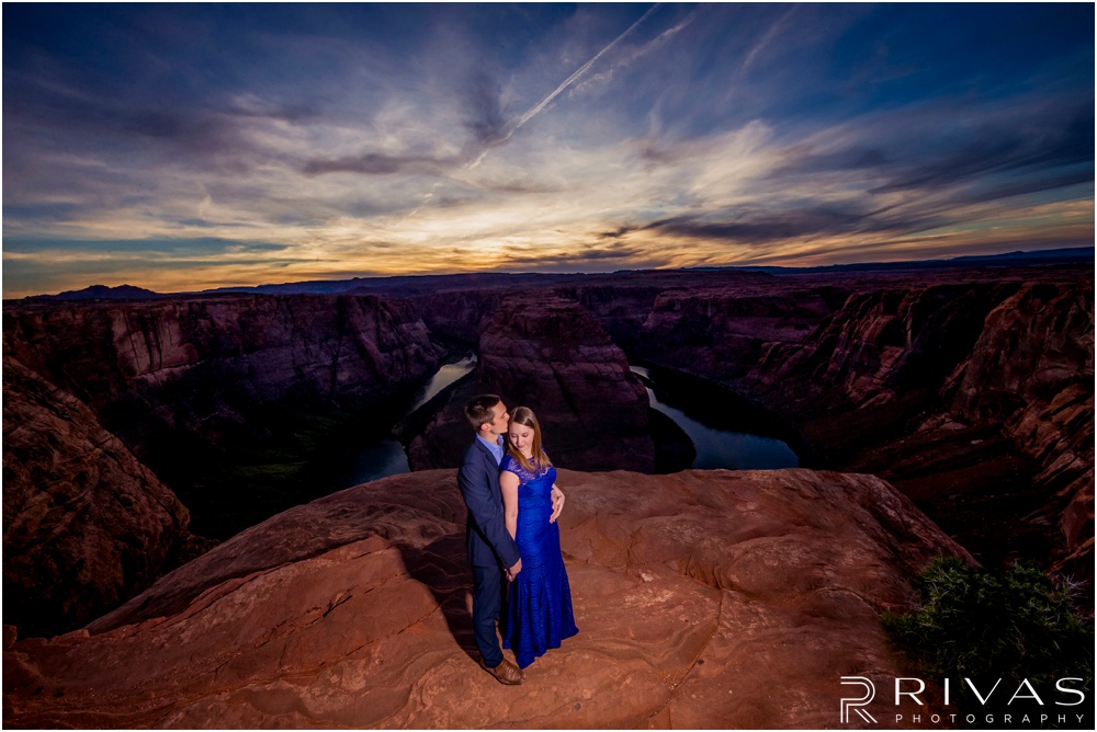 Merry-Go-Round Rock Engagement Session | Picture of a dressed up engaged couple overlooking Horseshoe Bend in Page Arizona. 