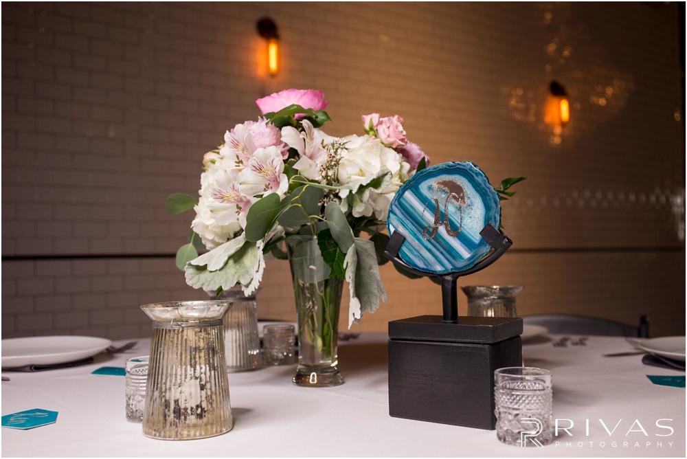 Vibrant Spring Wedding at The Guild | A close-up picture of reception table settings and details at The Guild KC. 