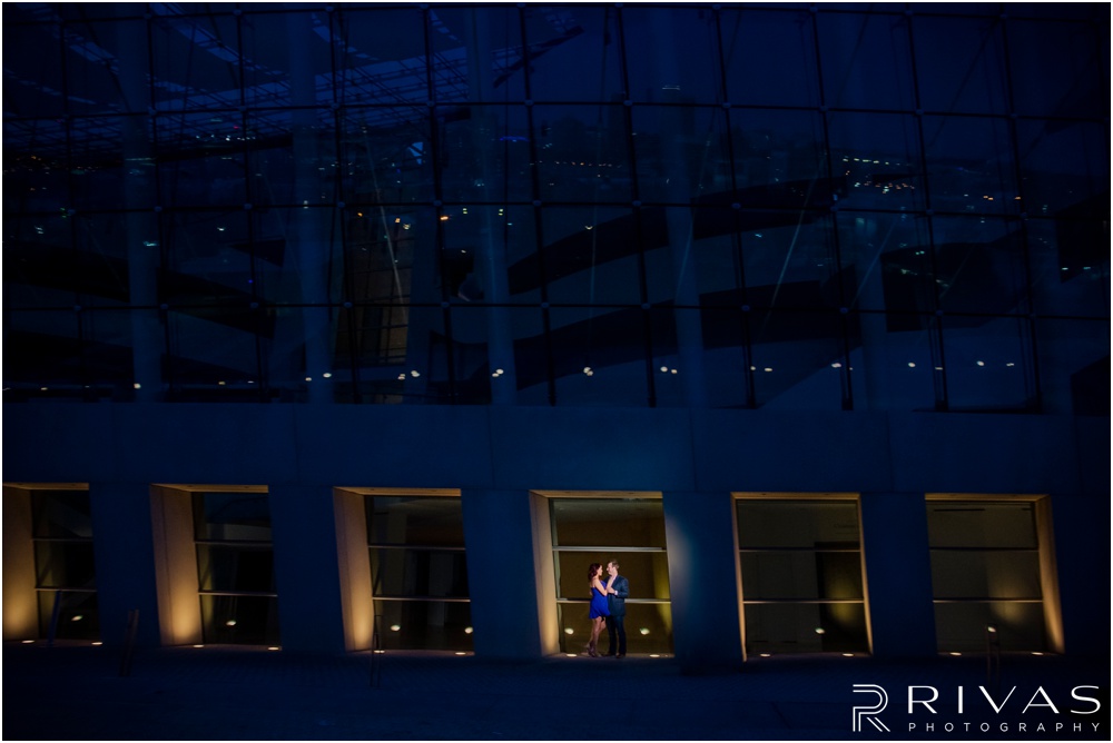 nighttime engagement photos Kansas City  at The Kauffman Center for the Performing Arts with an engaged couple. 