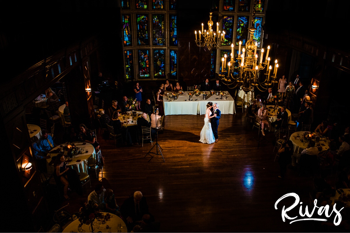 Strawberry Hill Summer Wedding | Rivas Photography | Kansas City Wedding Pictures | A picture taken from the balcony of a bride dancing with her father during her wedding reception held in the Tudor Room at The Brass on Baltimore in downtown Kansas City. 