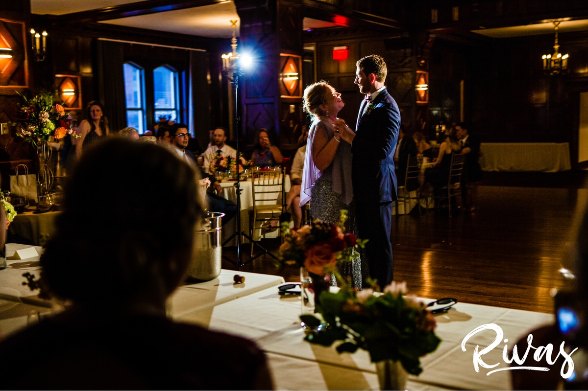 Strawberry Hill Summer Wedding | Rivas Photography | Kansas City Wedding Pictures | A photo of a groom dancing with his mom during his wedding reception held in downtown Kansas City in The Tudor Room at The Brass on Baltimore.. 