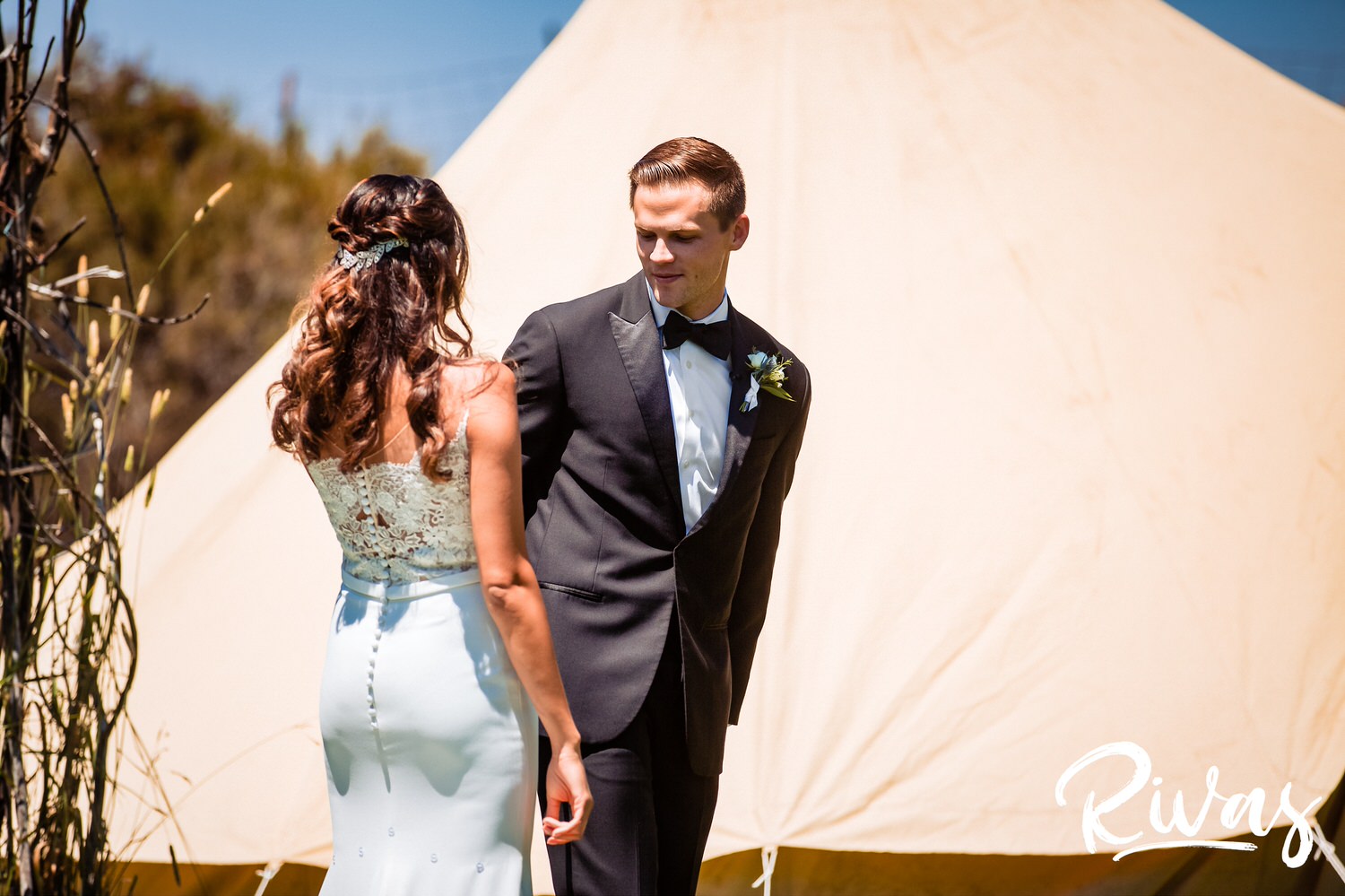 Saddlerock Ranch Summer Wedding | Destination Wedding Photographers | Rivas | A candid image of a groom seeing his bride for the first time on their wedding day at Saddlerock Ranch's Camp Cabernet. 