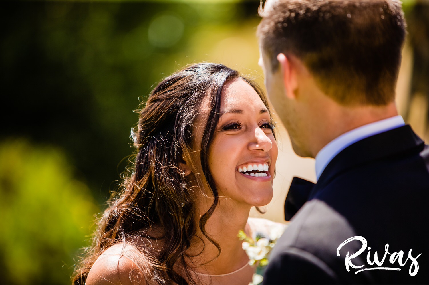 Saddlerock Ranch Summer Wedding | Destination Wedding Photographers | Rivas | A candid image of a bride seeing her groom for the first time on their wedding day at Saddlerock Ranch's Camp Cabernet. 