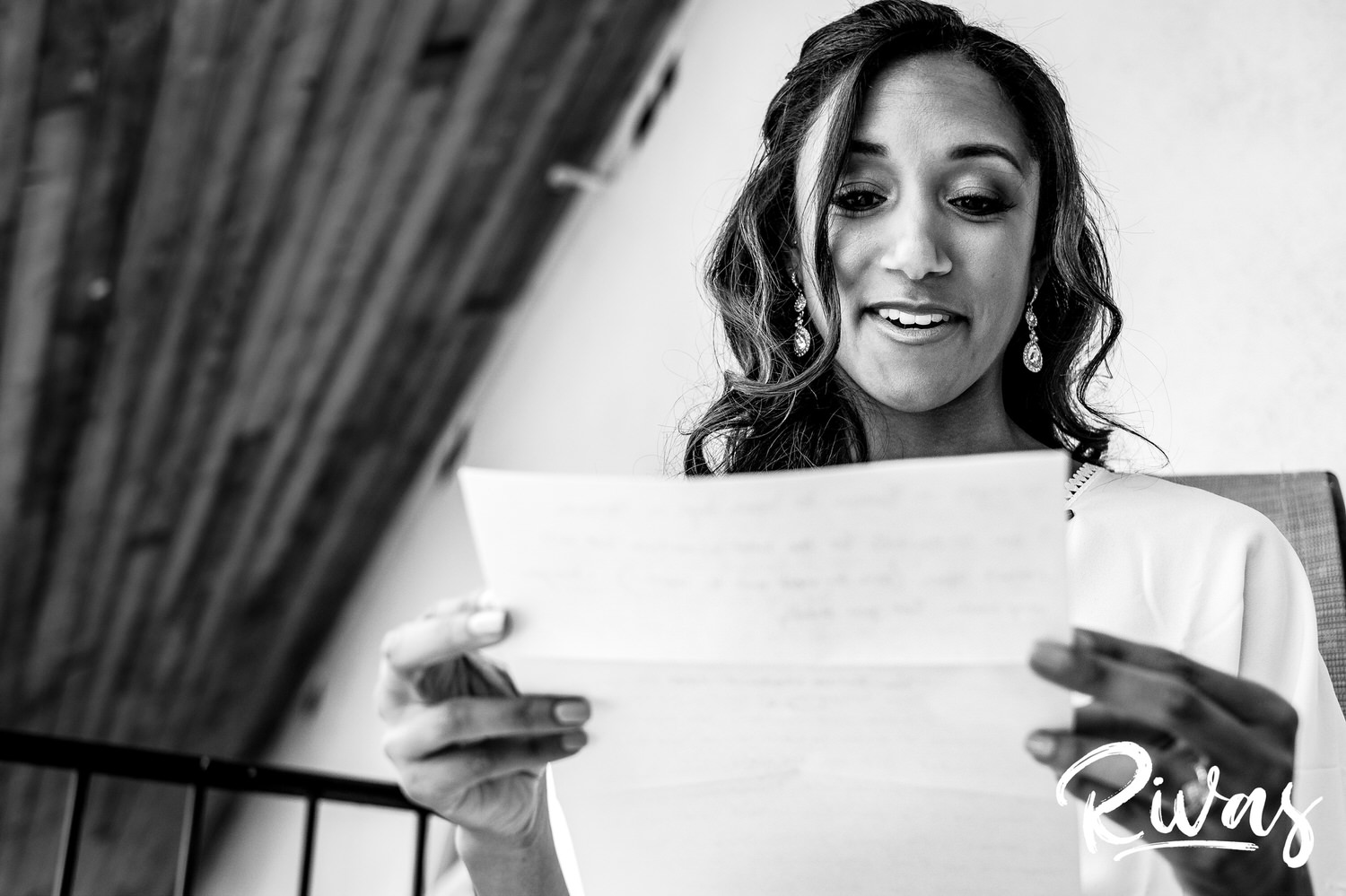 Saddlerock Ranch Summer Wedding | Destination Wedding Photographers | Rivas | A candid picture of a bride reading a letter written by her groom on the morning of her wedding. 