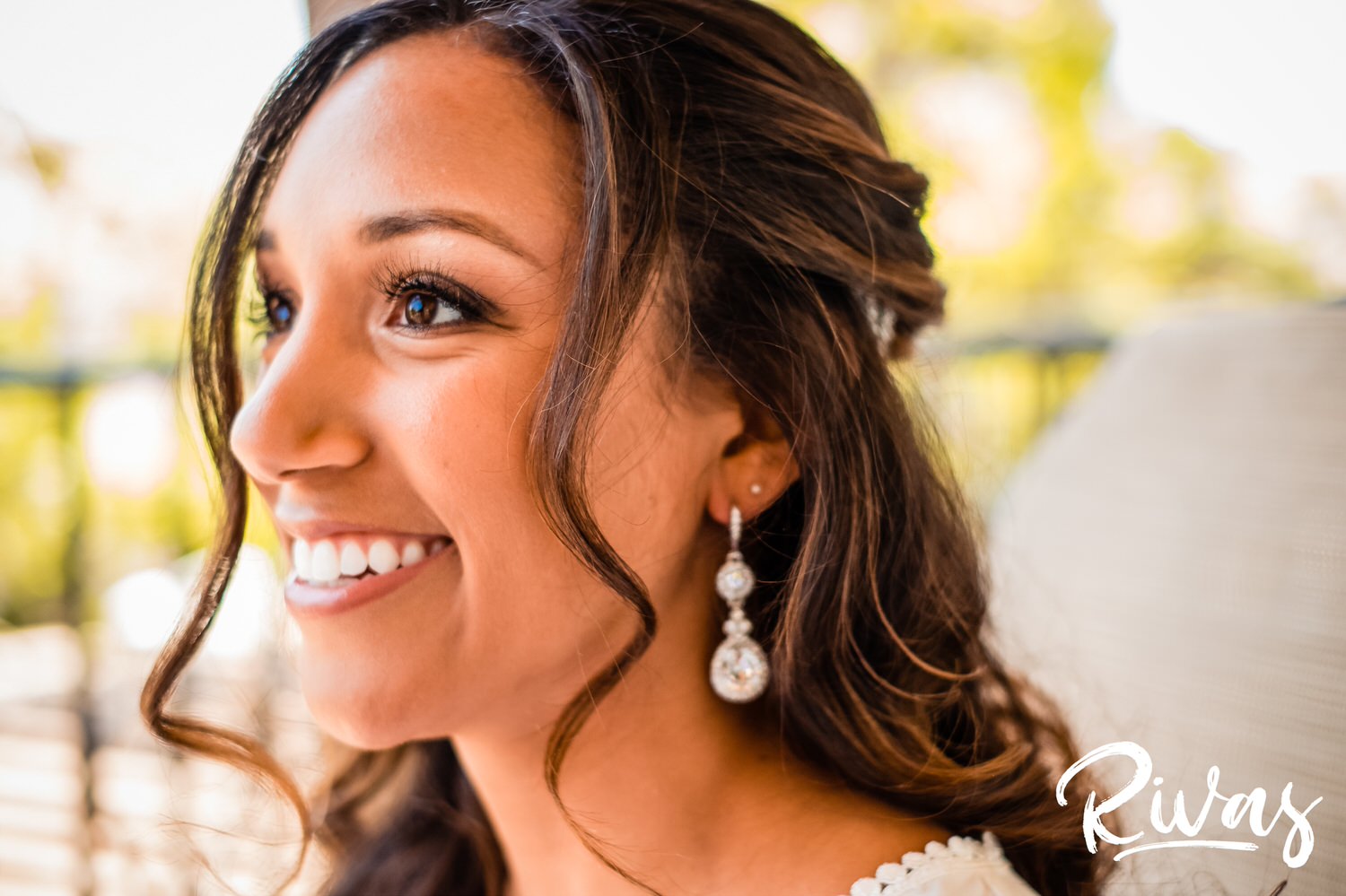 Saddlerock Ranch Summer Wedding | Destination Wedding Photographers | Rivas | A candid image of a bride smiling at her bridesmaids on the morning of her wedding at Saddlerock Ranch in Malibu, California. 