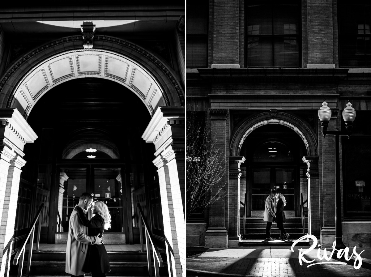 KC Winter Lights Engagement Pictures | Kansas City engagement Pictures | Rivas | Two black and white pictures of an engaged couple in dress coats laughing together and sharing an embrace as they're standing in a decorative, brick archway in downtown Kansas City during their late December Engagement Session. 