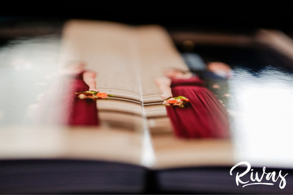 Maroon & Navy Custom Wedding Album | A staged picture of the invisible seam of a custom wedding album. 