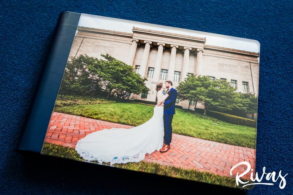 Maroon & Navy Custom Wedding Album | A staged picture of the crystal glance cover of a custom wedding album. 