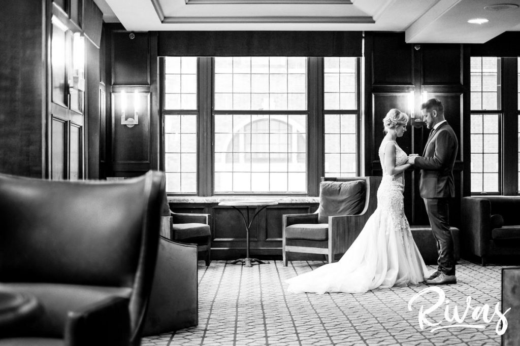 Art Deco Inspired Wedding in Kansas City | A candid image of a bride and groom seeing each other for the first time on their wedding day. 