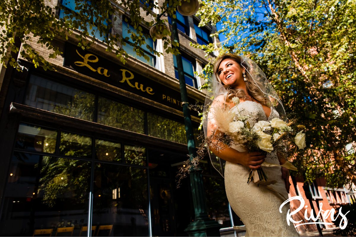Harvest Goddess Bride | Kansas City Wedding Photographers | Rivas Weddings | A photo of a fall bride with a neutral bouquet taken in front of Kansas City's LaRue Baltimore Event Space.