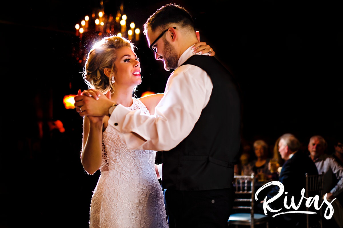 A romantic picture of a bride and groom sharing their first dance during their winter wedding reception at The Stanley in downtown Lee's Summit. 