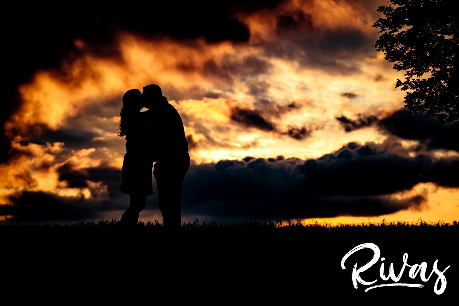 A vibrant picture of an engaged couple on-location for their engagement session at sunset in Kansas City. 