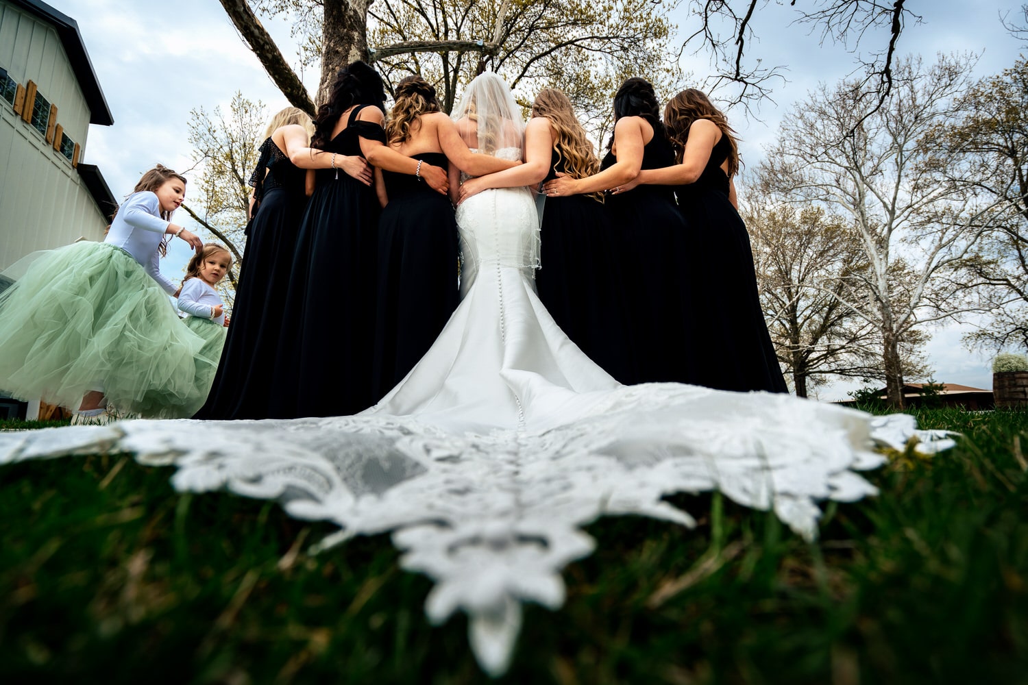 A picture taken from the ground looking up of a bride's wedding gown train. 