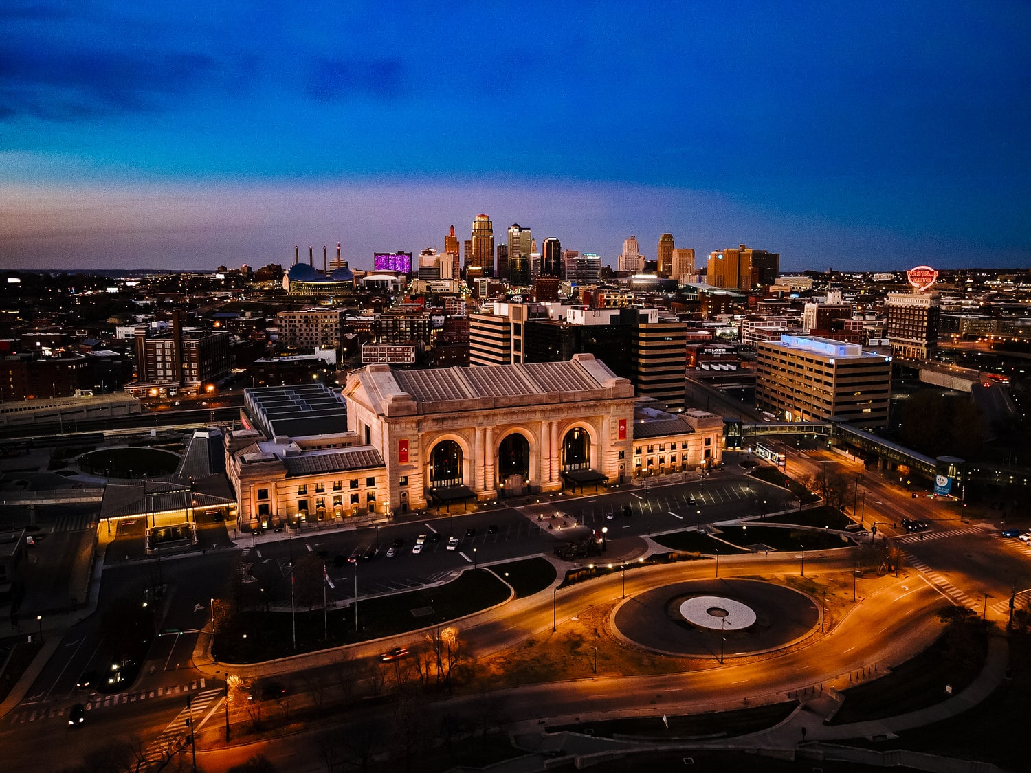 A picture taken using a drone from the top of Liberty Memorial of downtown Kansas City at sunset. 